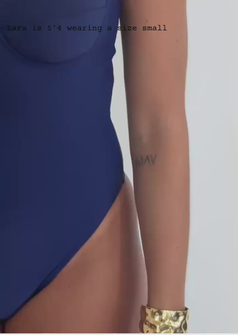 video of woman in blue one piece swimsuit